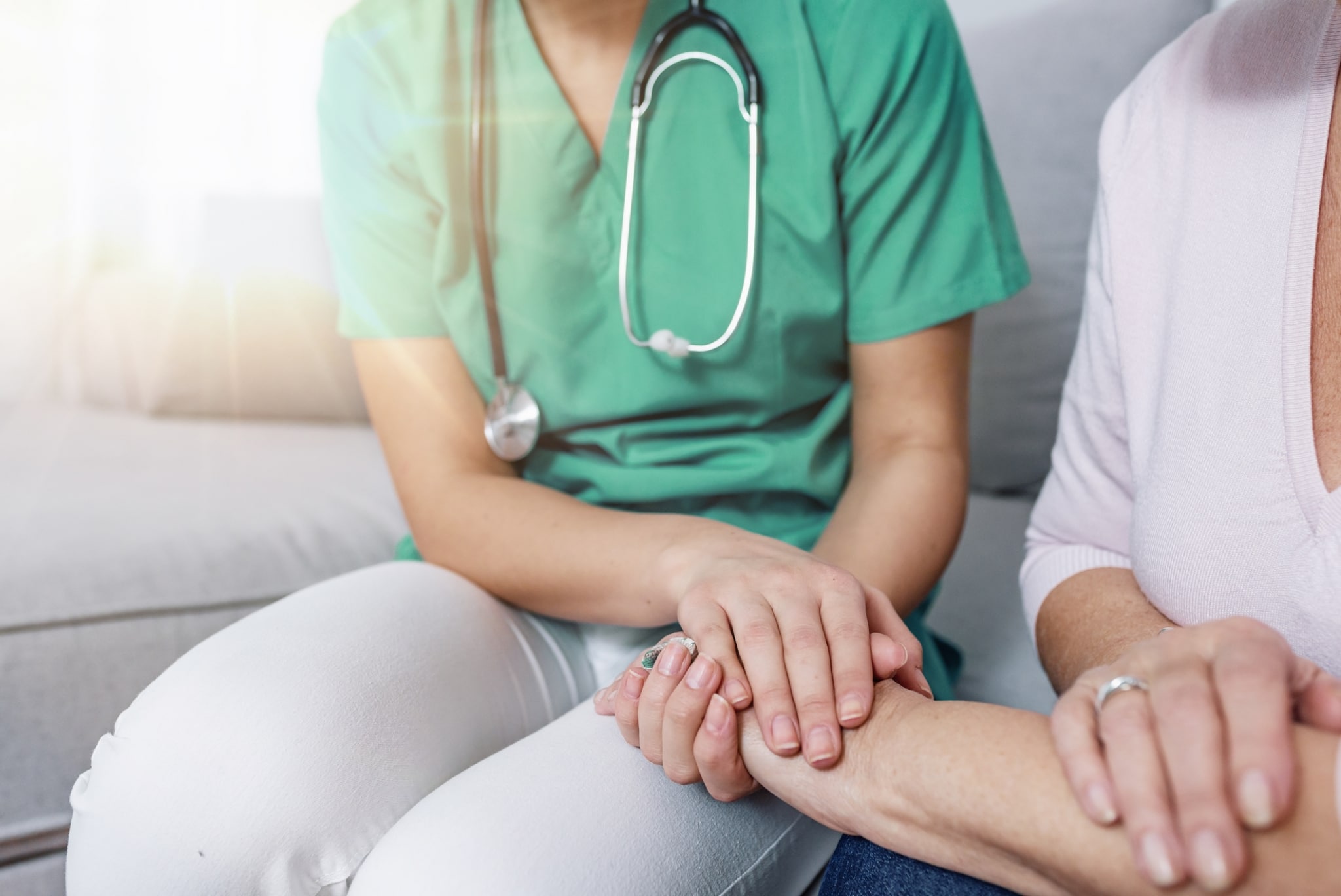 Nurse consoling patient