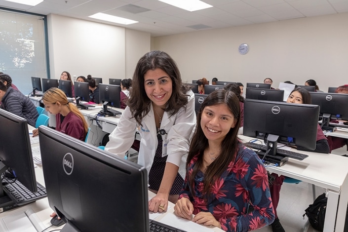 Student and instructor in the classroom