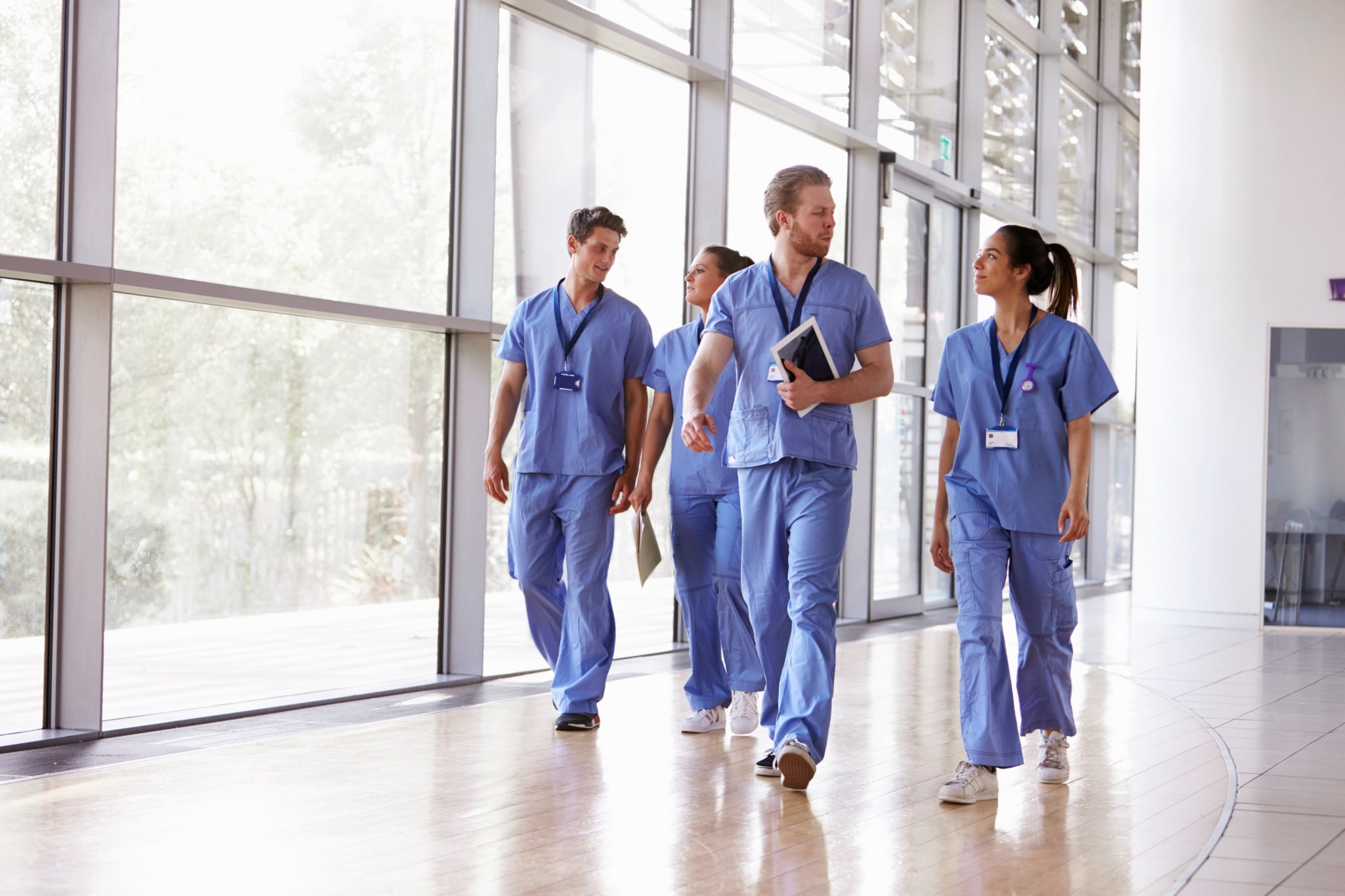 Healthcare team walking in a hallway