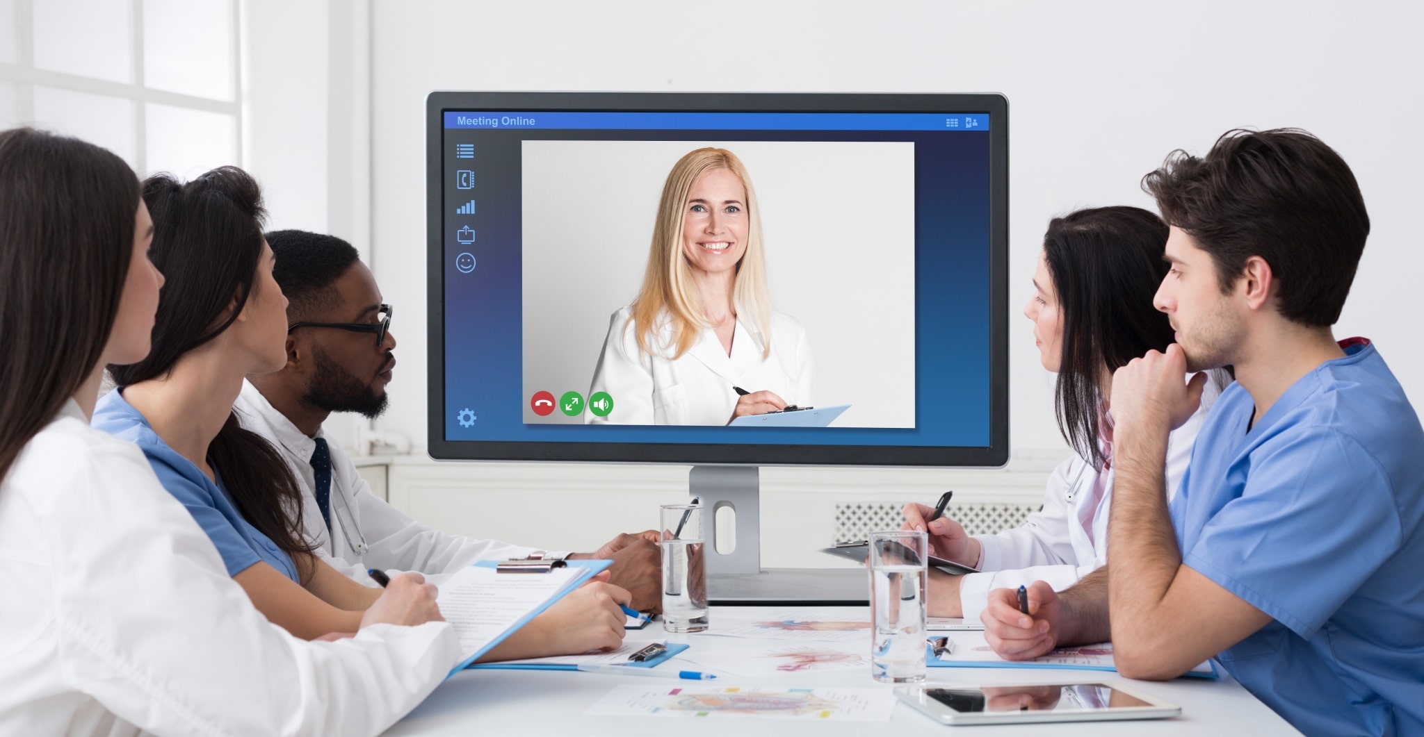 Group of medical students with an online instructor