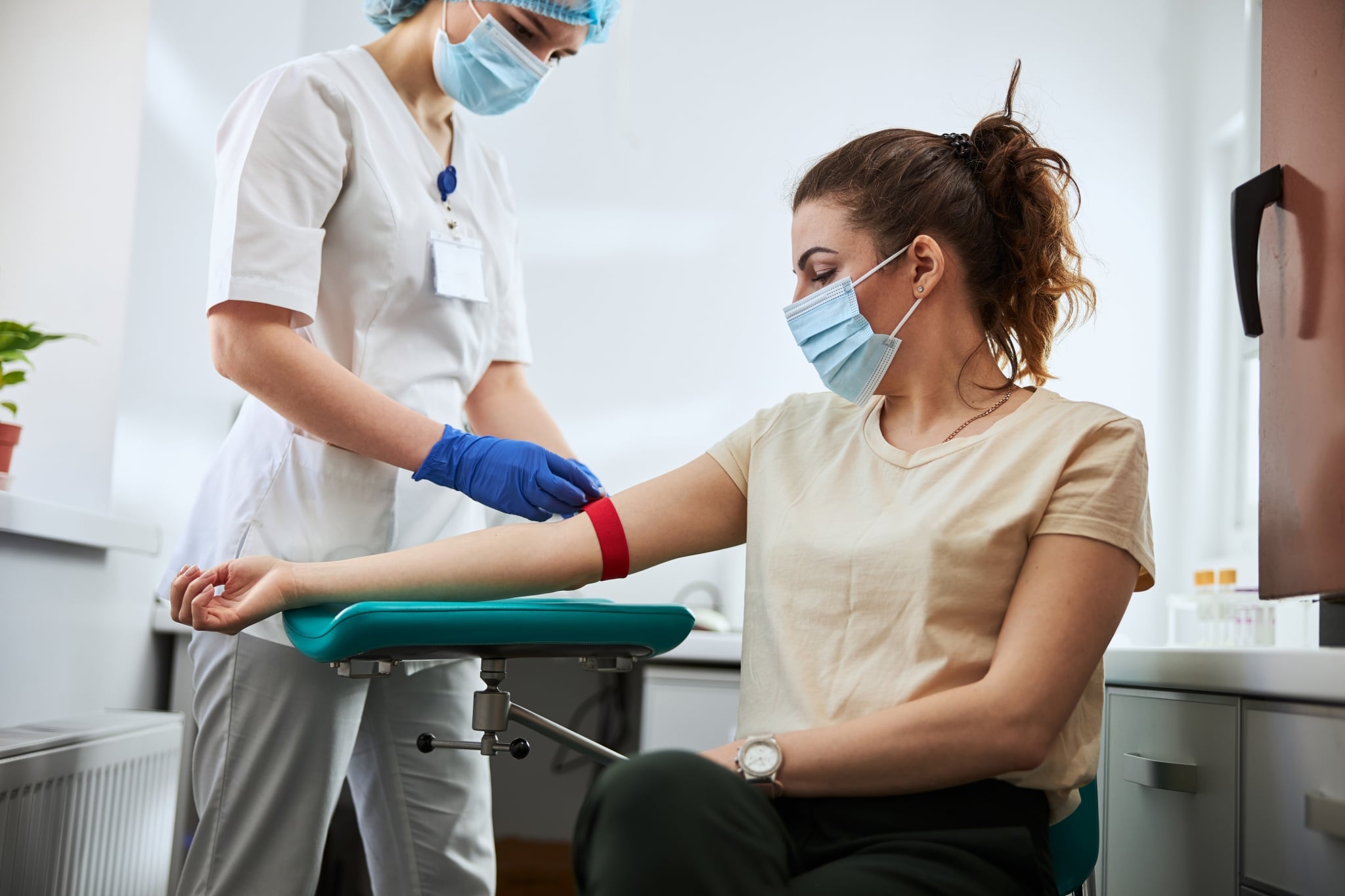 Phlebotomist drawing blood