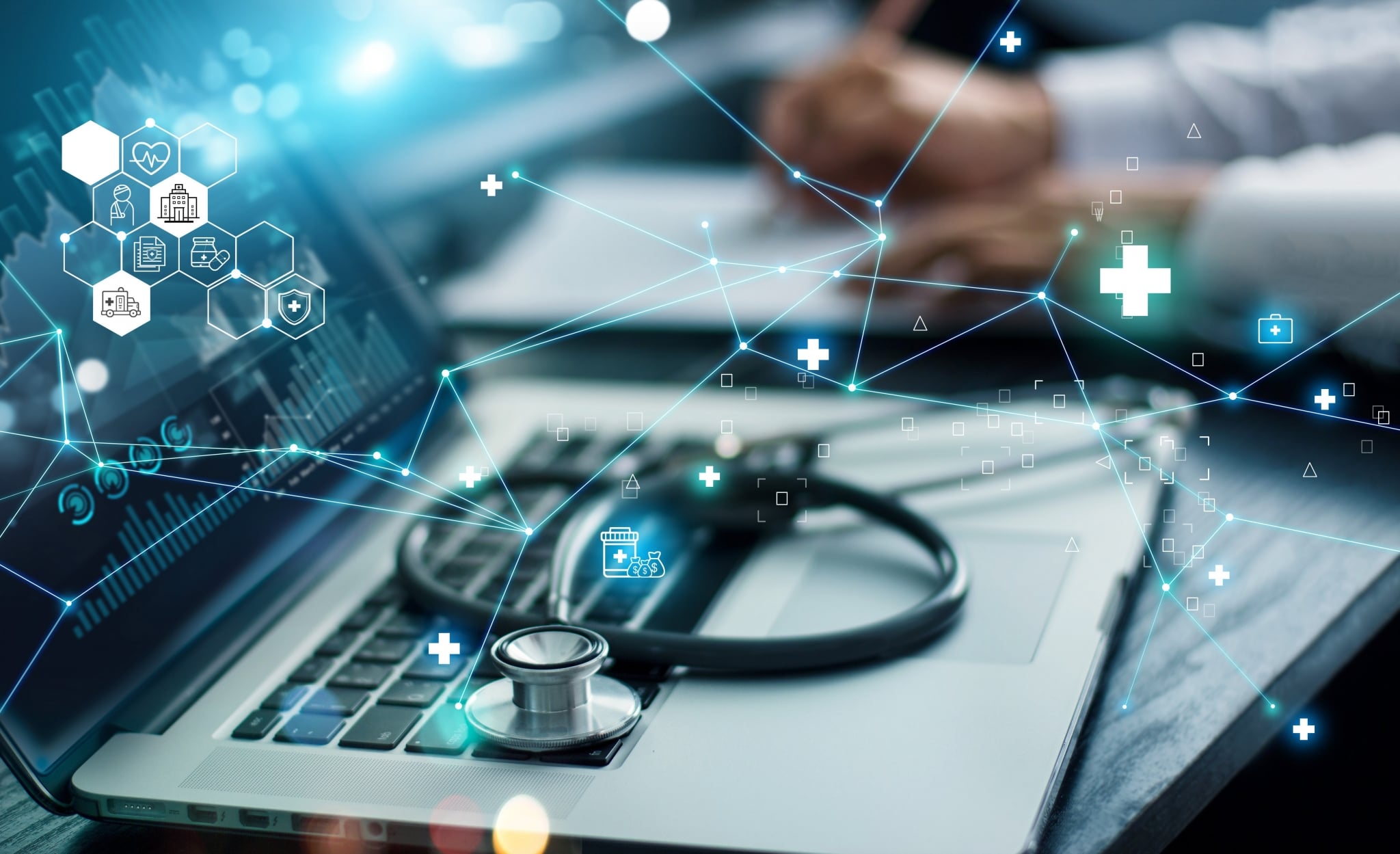 Close up of laptop and stethoscope