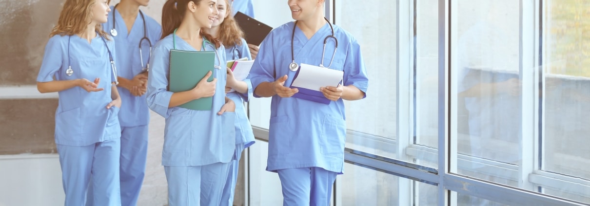 Young medical students in a hallway