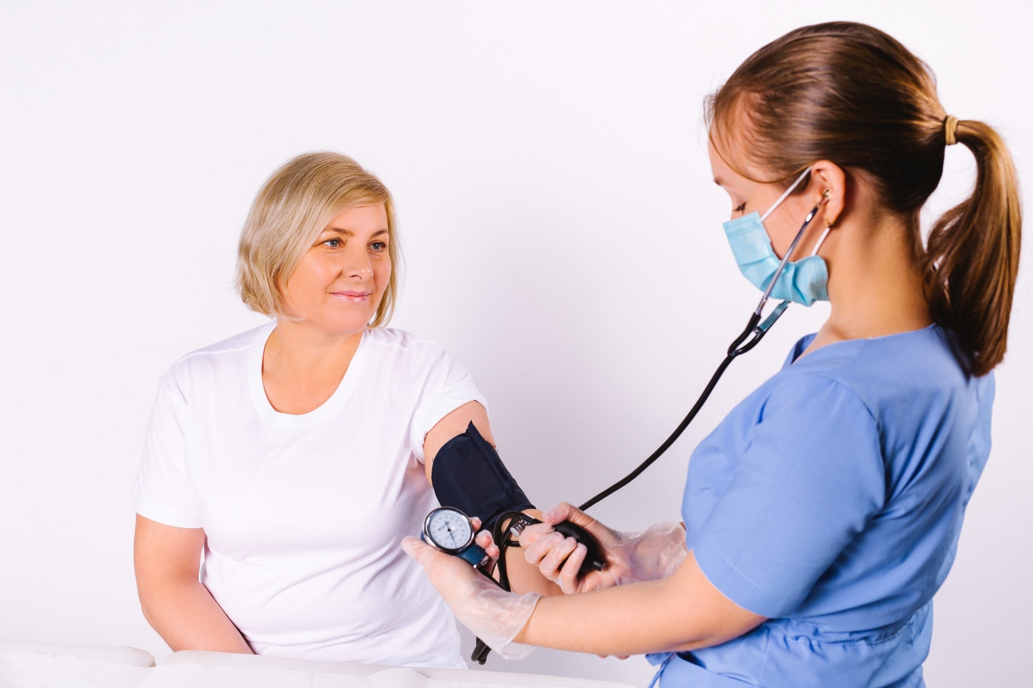 Medical professional taking a patient's vital signs