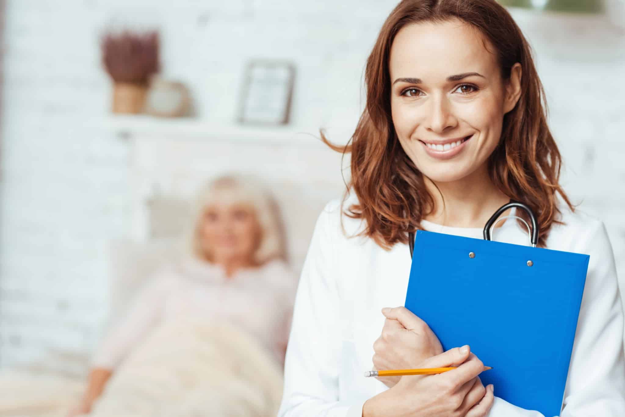 Healthcare professional holding a clipboard
