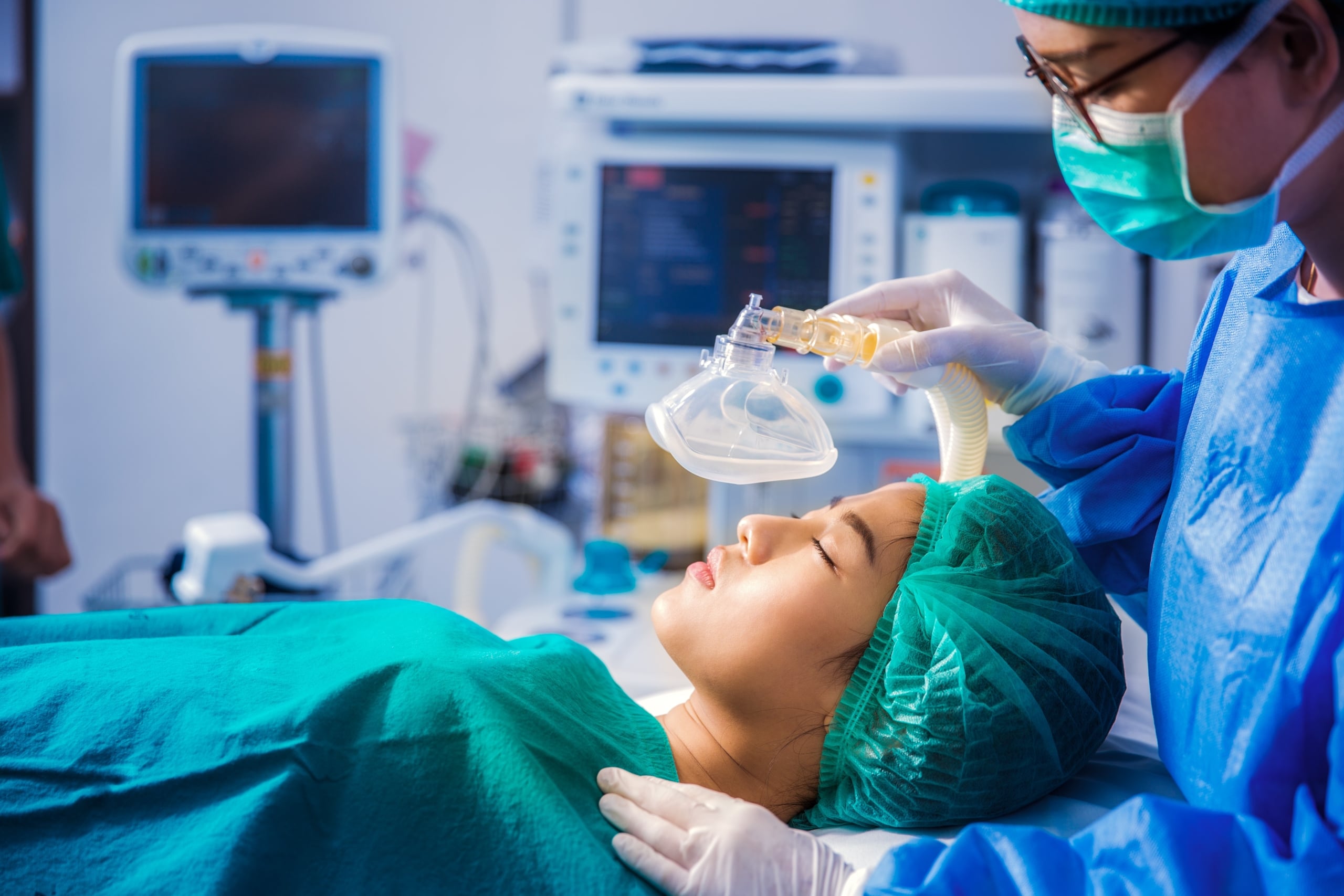 Nurse anesthetist with a patient