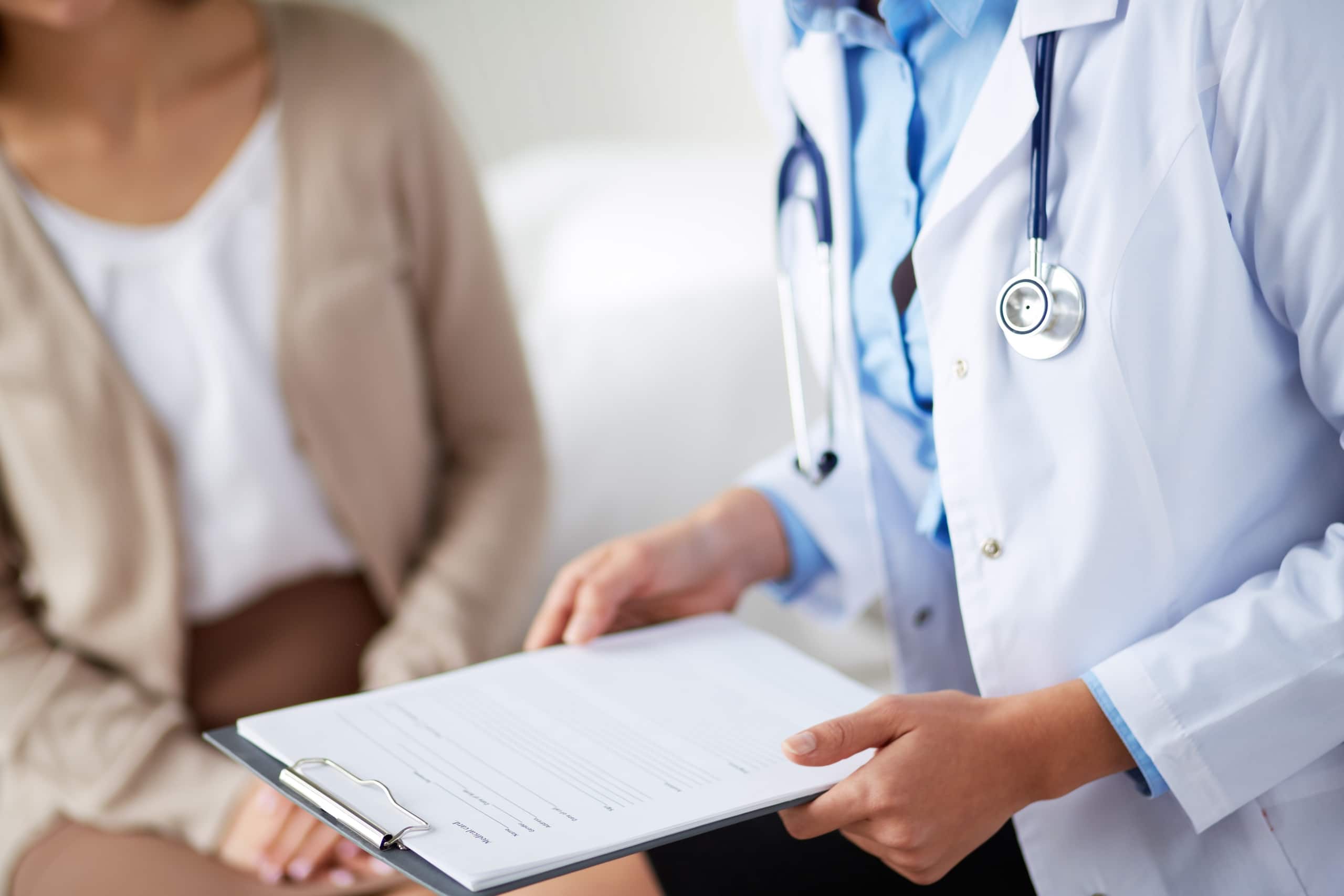 Medical professional with a patient's chart