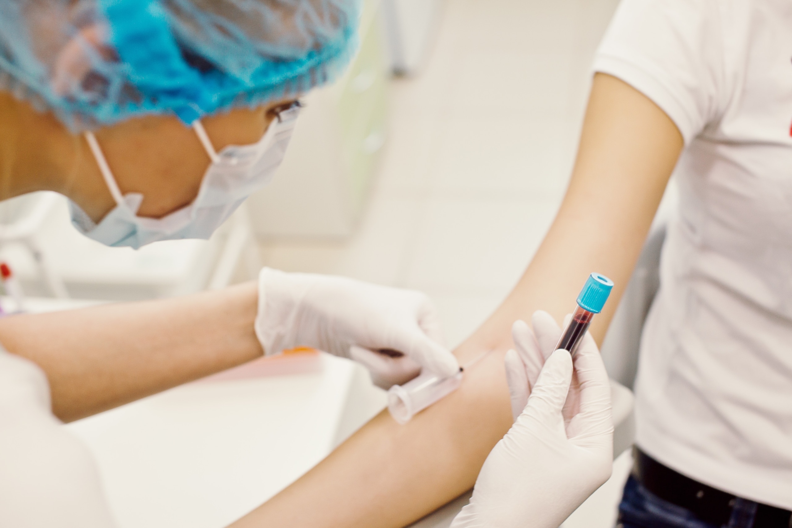 Medical professional drawing blood