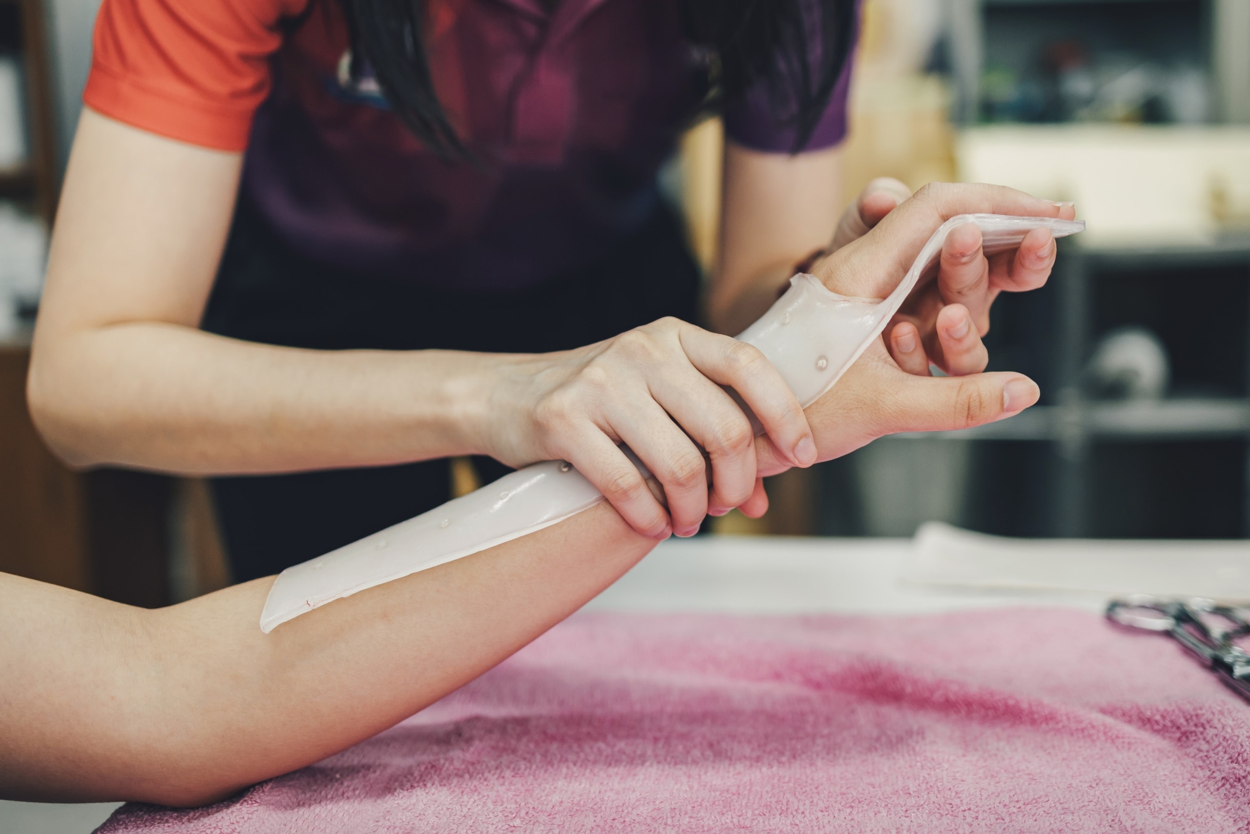 Medical professional placing a splint