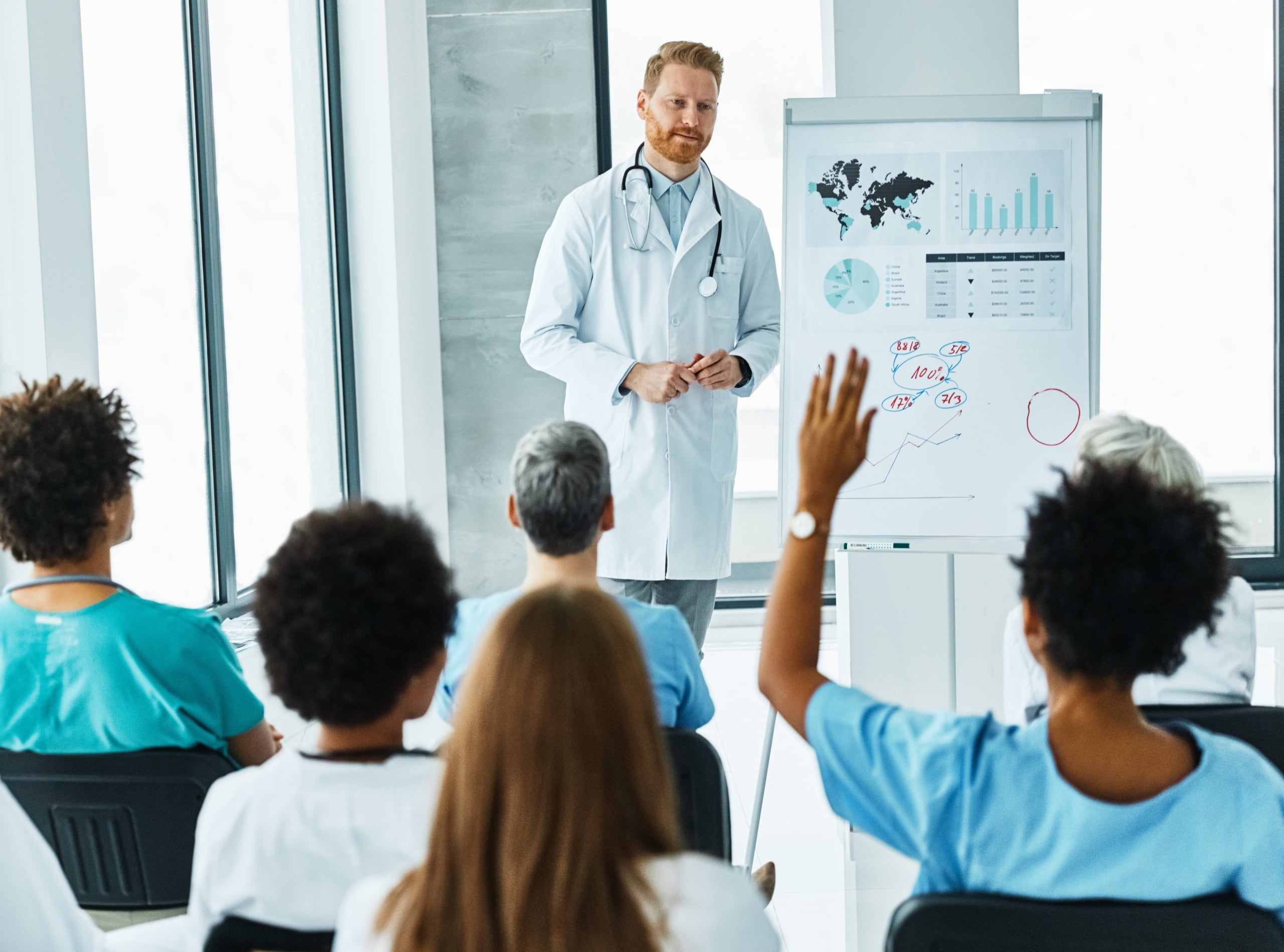 Medical professor giving a lecture to group of students