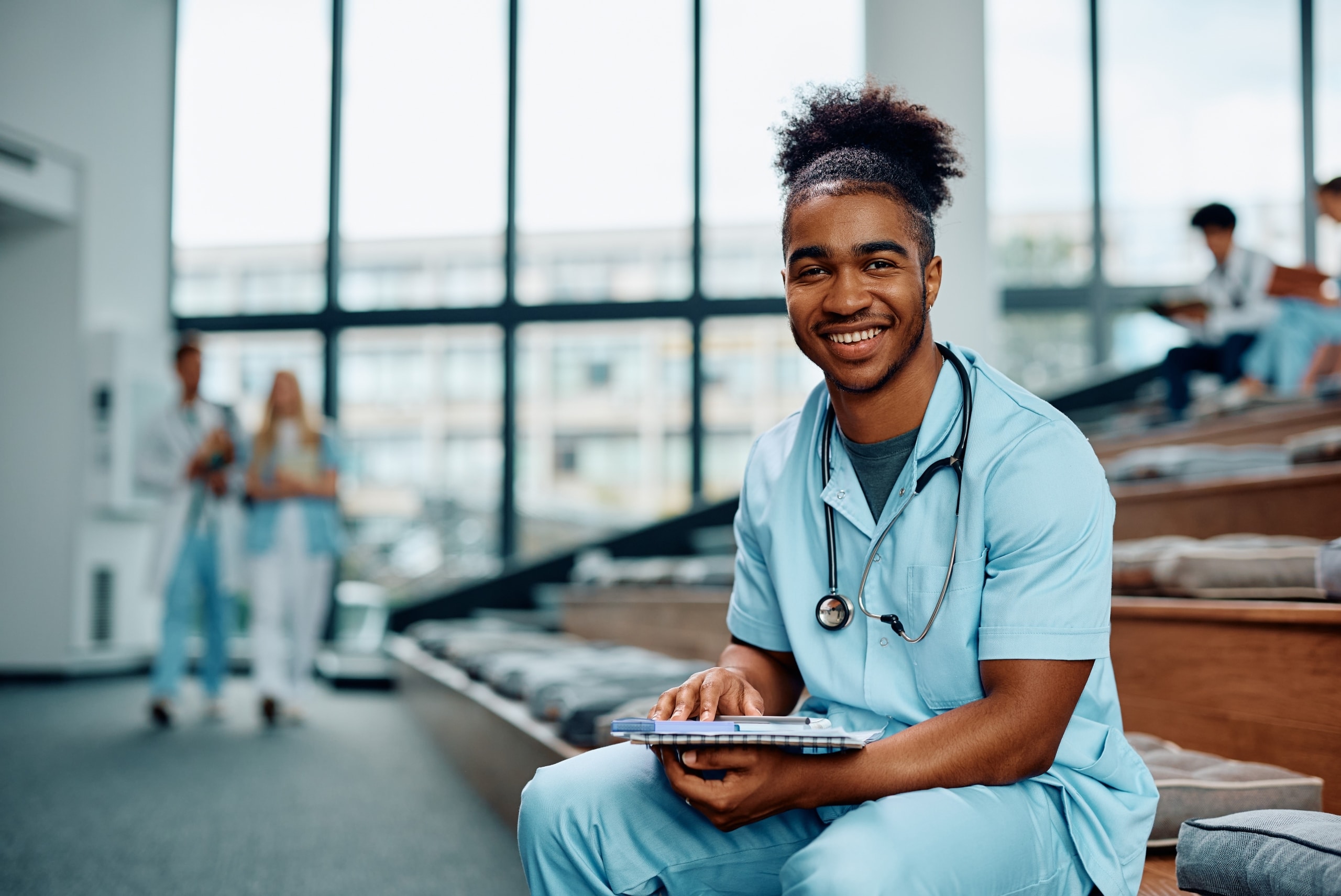 African-American nursing student sitting in a lecture hall