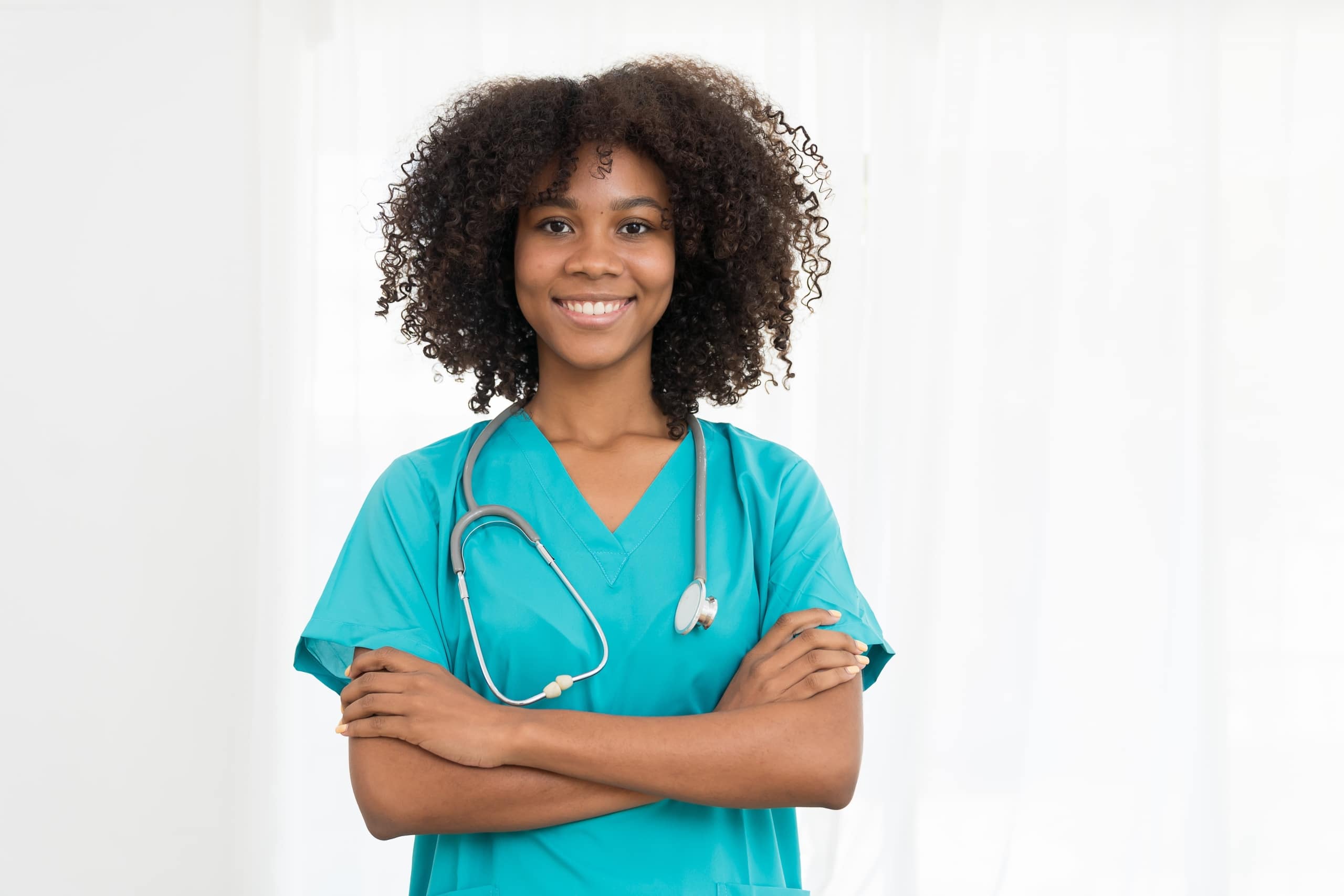 Female African-American nurse in scrubs