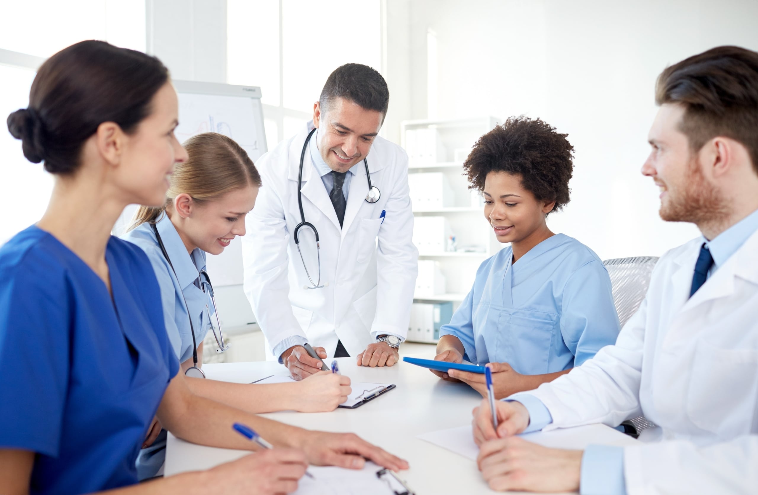 Male instructor with a group of medical professionals