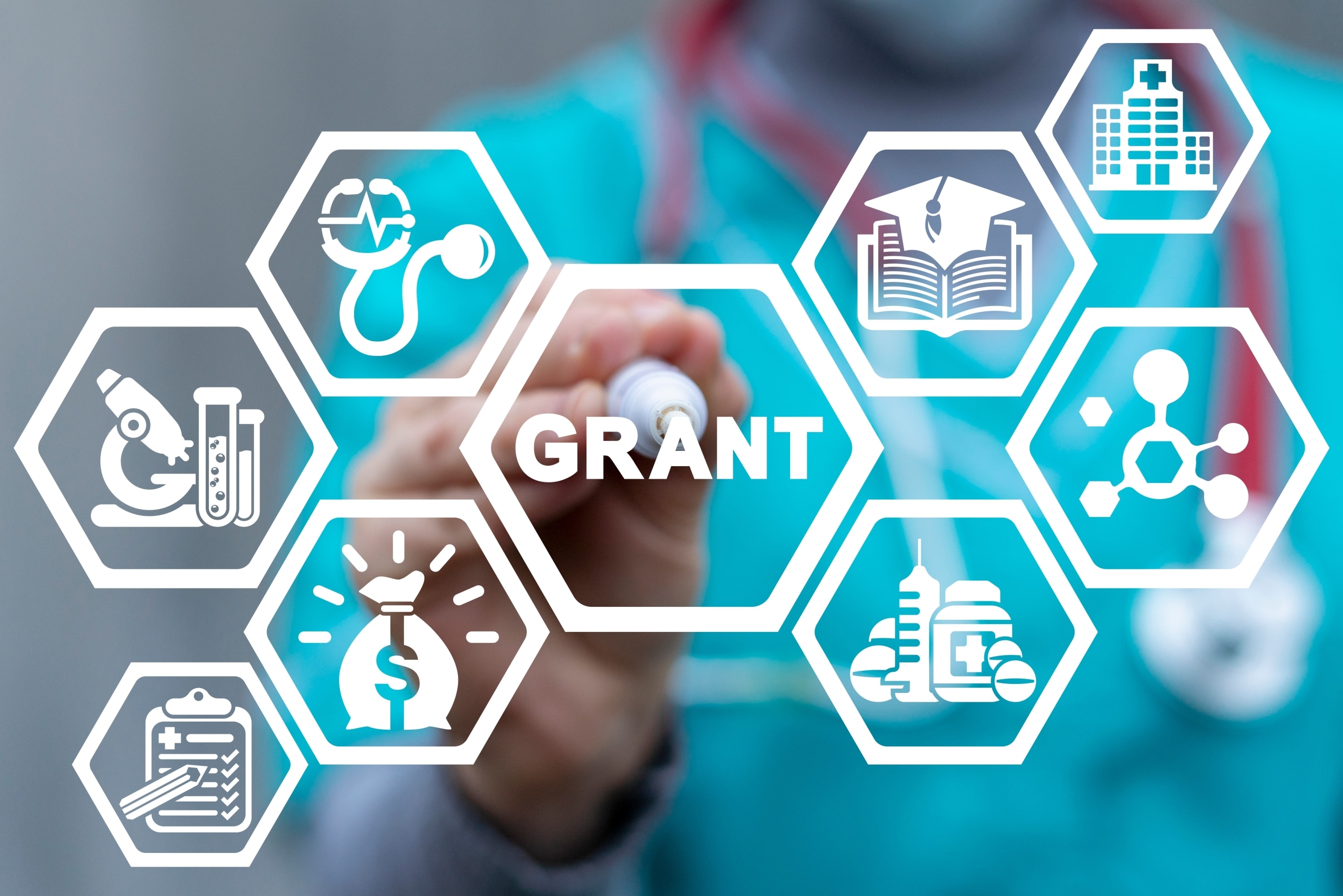 Medical professional touching virtual symbols for financial aid