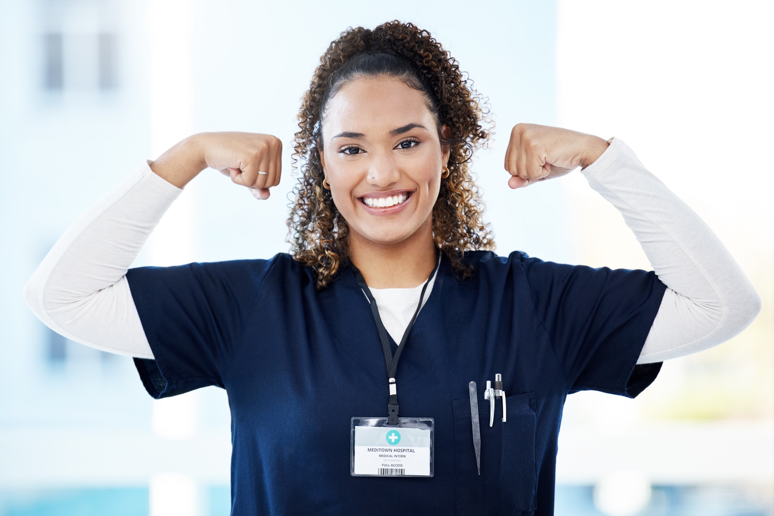 African-American nurse striking a strong pose