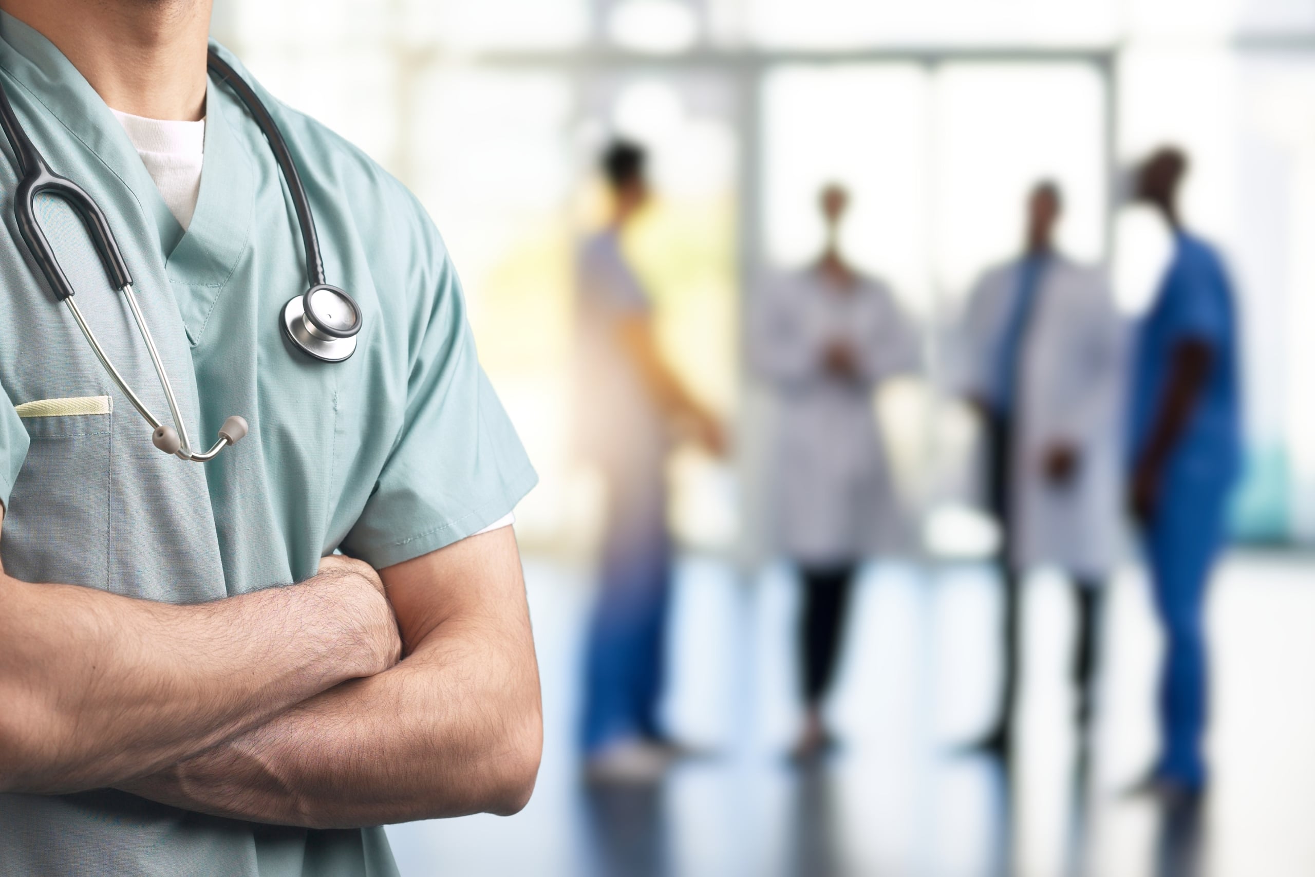 Close up of a male nurse in scrubs
