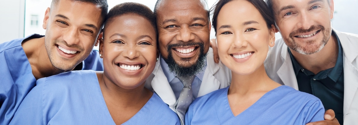 Diverse group of medical professionals smiling together