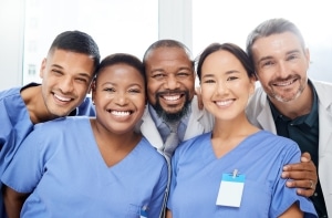 Diverse group of medical professionals smiling together